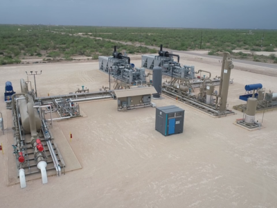 Modular natural gas compressor station with integrated process skids and piping, engineered and assembled by Spitzer.